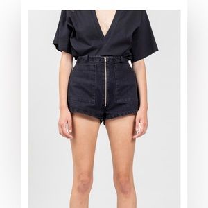 Black denim mini shorts with exposed zipper